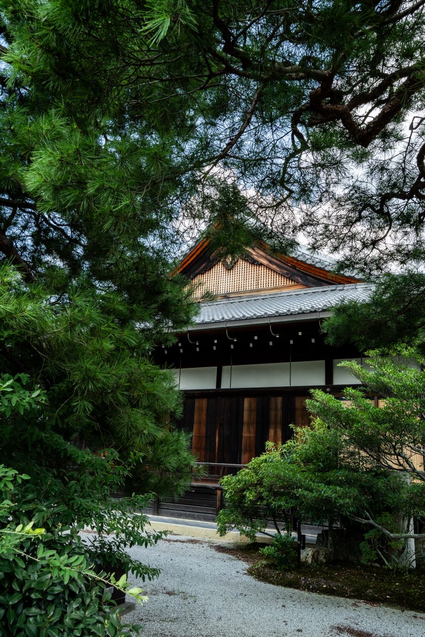 Zen rock garden and wooden cedar temple terrace in Kyoto Japan